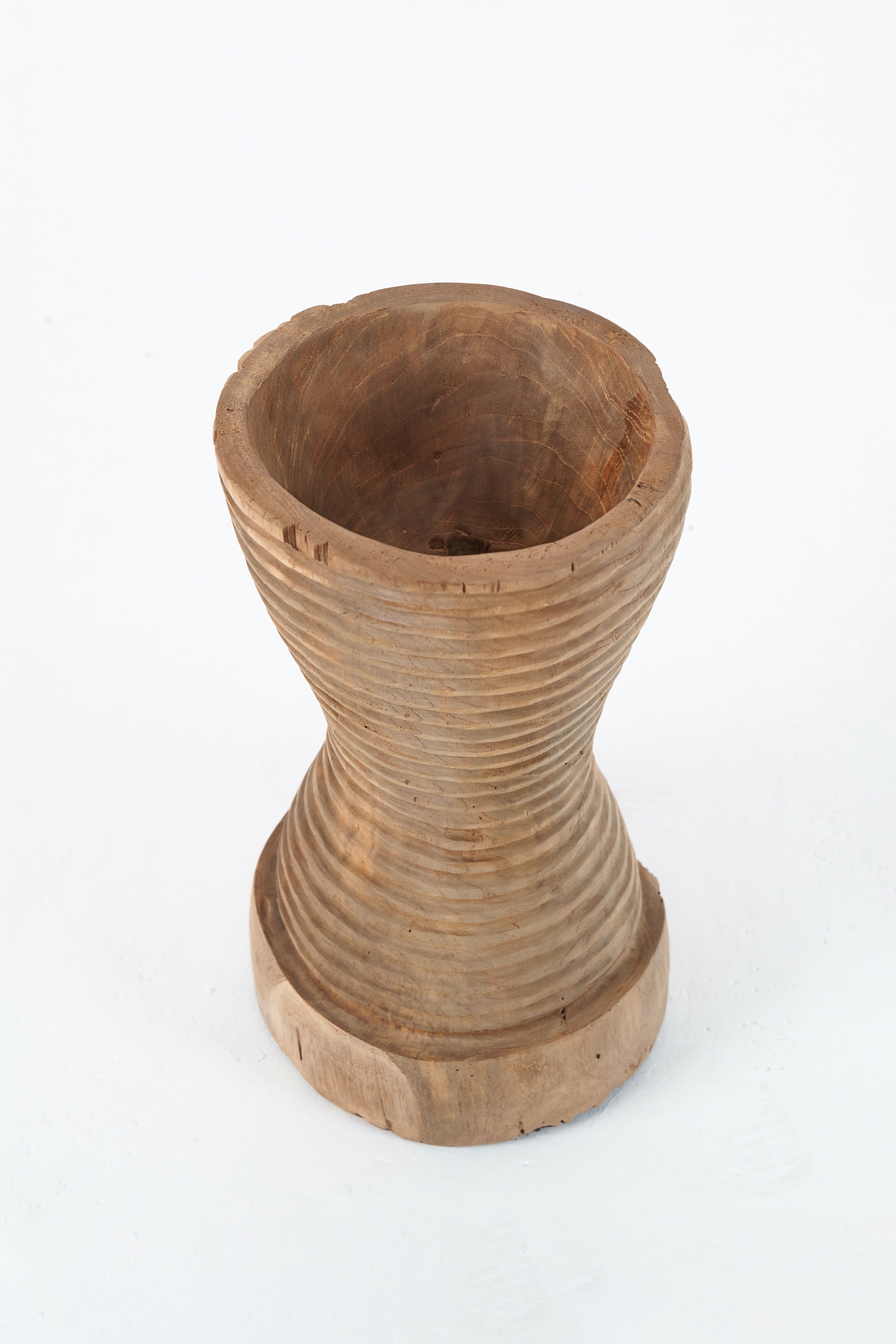 Stacked ring carved vessel