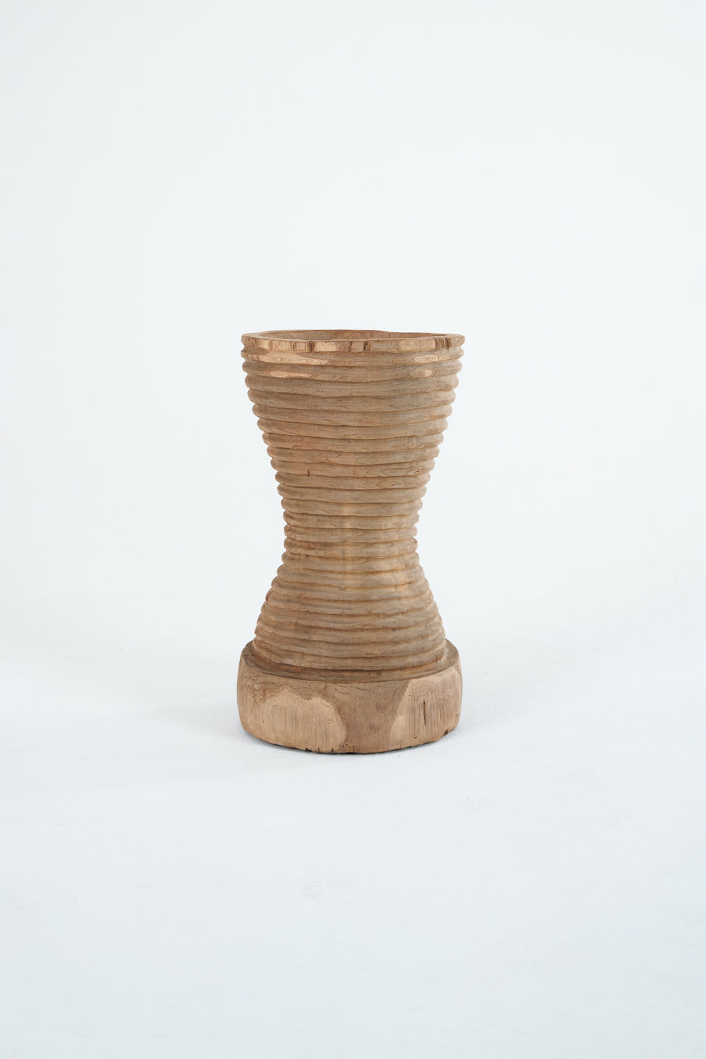 Stacked ring carved vessel