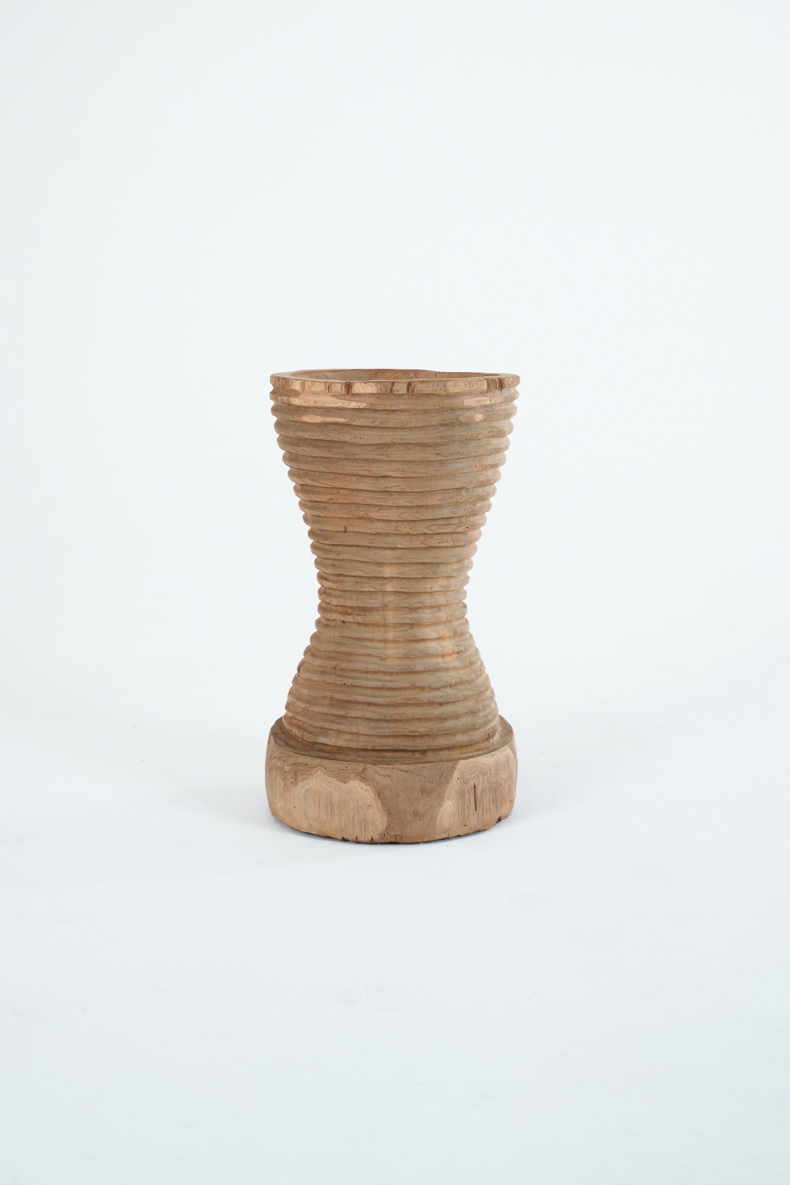 Stacked ring carved vessel